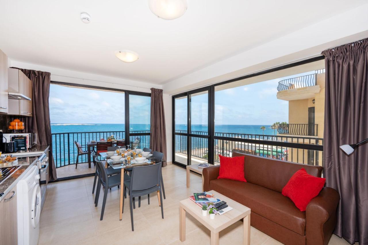 Islet Promenade Seafront Apartment With Large Corner Terrace By Getawaysmalta خليج سانت بول المظهر الخارجي الصورة